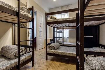 Односпальная кровать в общем номере для мужчин и женщин в  Centrum Hostel